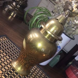 Brass urn with angel topper
